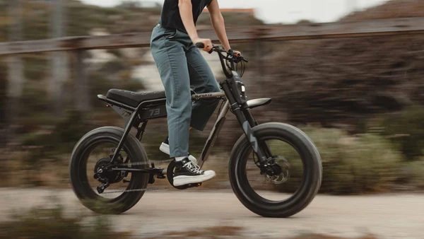 Rider in motion with coastal blur